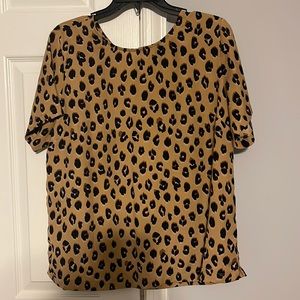 Cheetah print blouse.